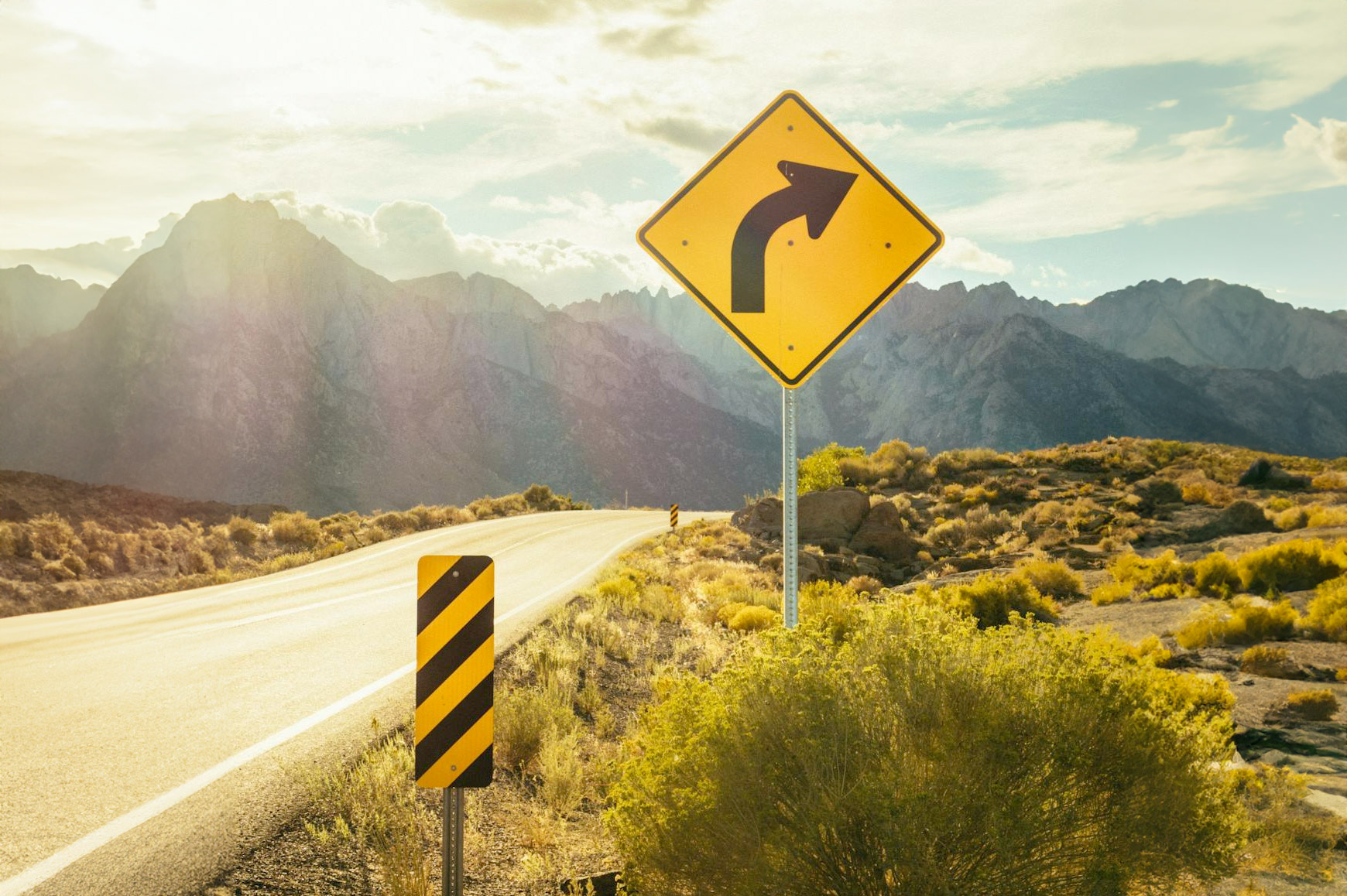 Road sign at a crossroads in open wilderness